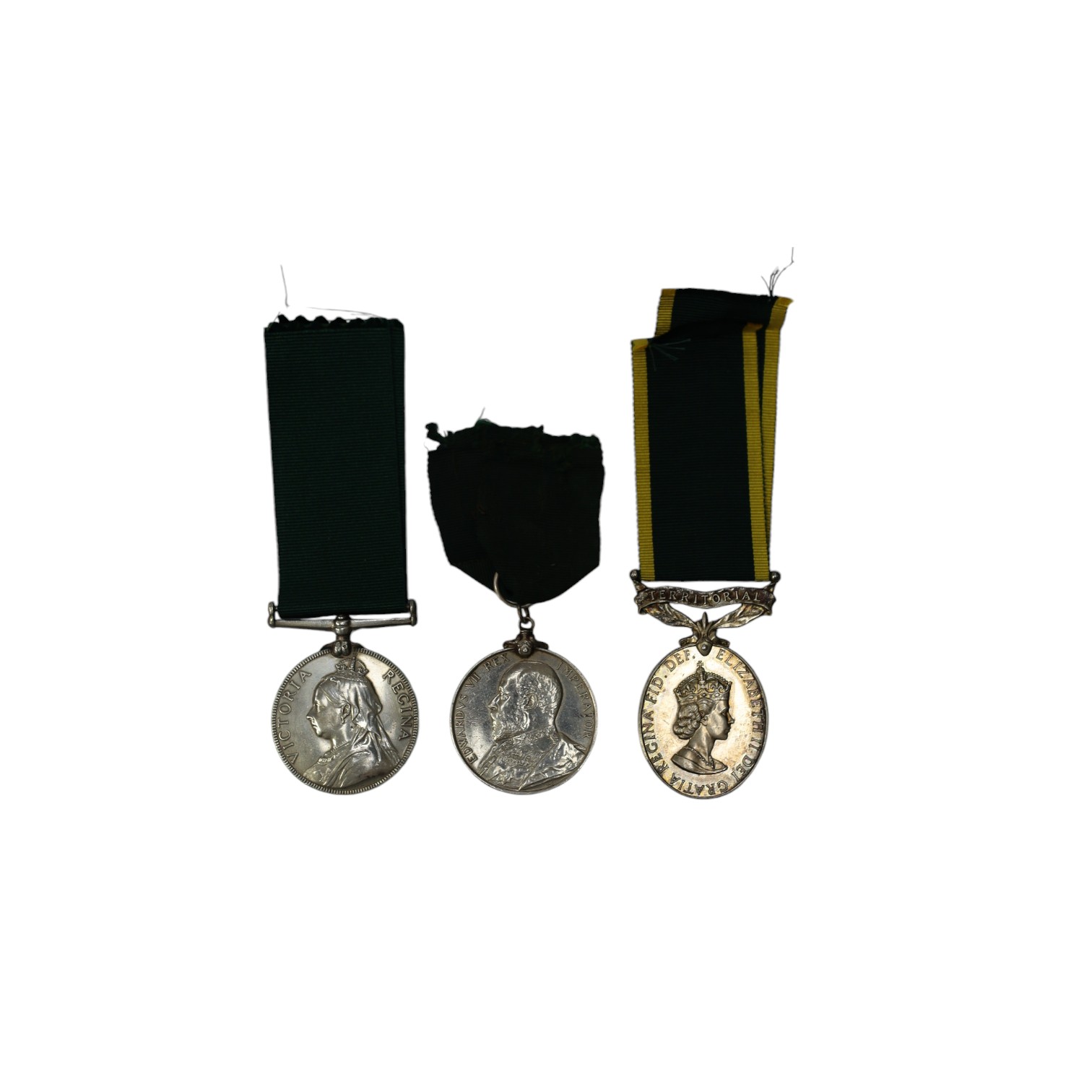 Three assorted service medals; Vict Volunteer Long Service to 186. Cpl. J.Camplin. 1st Dorset.Vol.Art: Ed VII Volunteer Long Service to 2731 Sjt:A.G.Wright. 4/V.B.Durham L.I.; ERII Territorial Efficiency Medal to 2228226